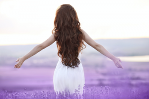 Girl displaying CBD hair growth.