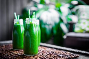 Jars of green smoothie drink